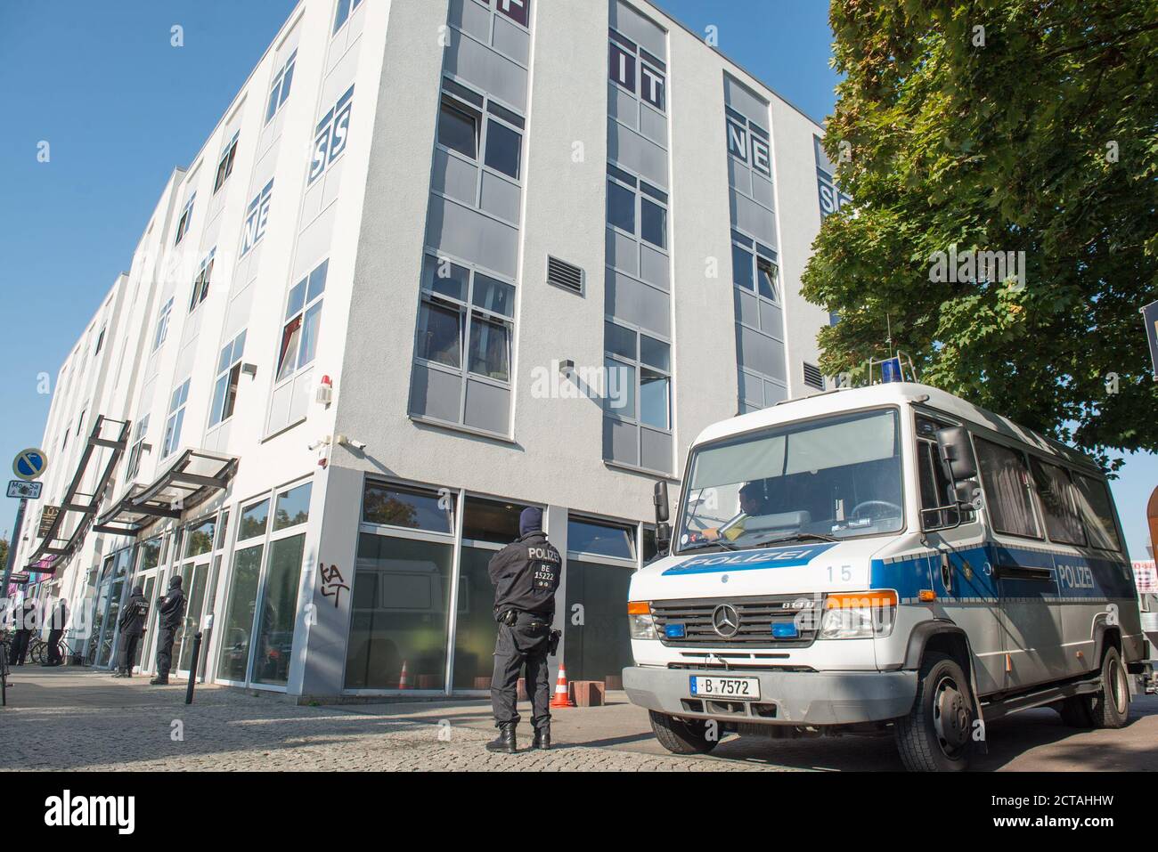 Berlin, Germany. 22nd Sep, 2020. Police officers and employees of the tax  investigation department are on duty during a search of an office building  in the Treptow district. Since 6 a.m., 300