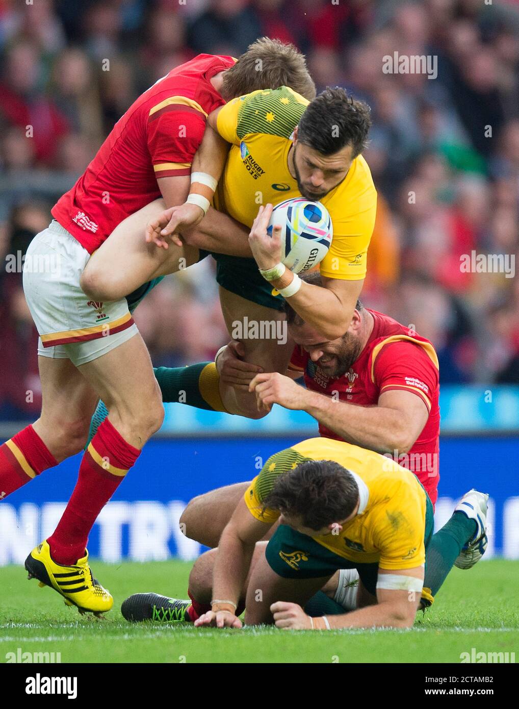 Adam Ashley-Cooper is upended by the welsh defence  Australia v Wales Rugby World Cup 2015  Picture Credit : MARK PAIN / ALAMY Stock Photo