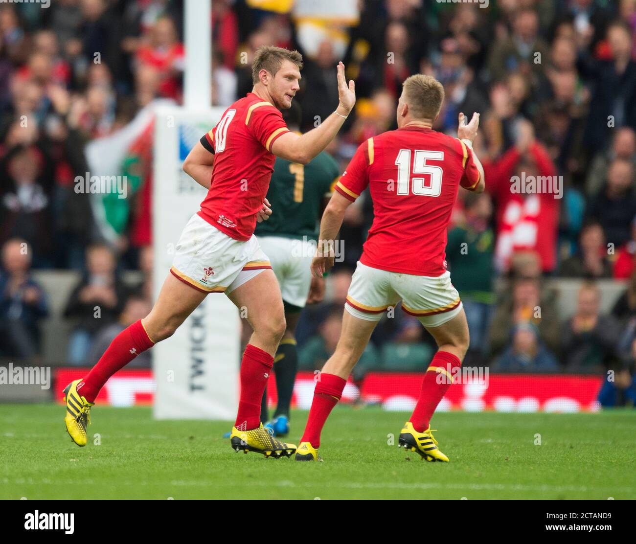 DAN BIGGAR IS CONGRATULATED BY GARETH ANSCOMBE ON KICKING A DROP GOAL IN THE FINAL SECONDS OF THE FIRST HALF TO SEND WALES IN AT HALF TIME 13-12 UP  W Stock Photo