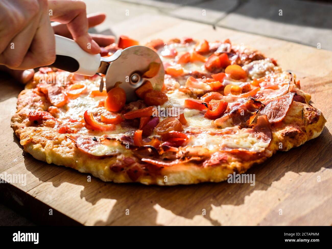 Making of homemade Italian pizza in fireplace brick oven. Making of