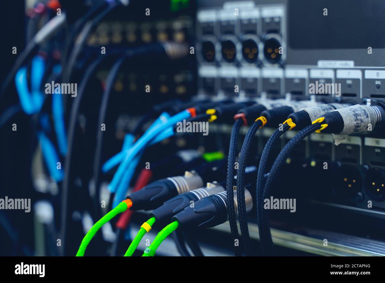 Audio jacks cable plugged into mixer console. XLR audio jacks cable Stock Photo