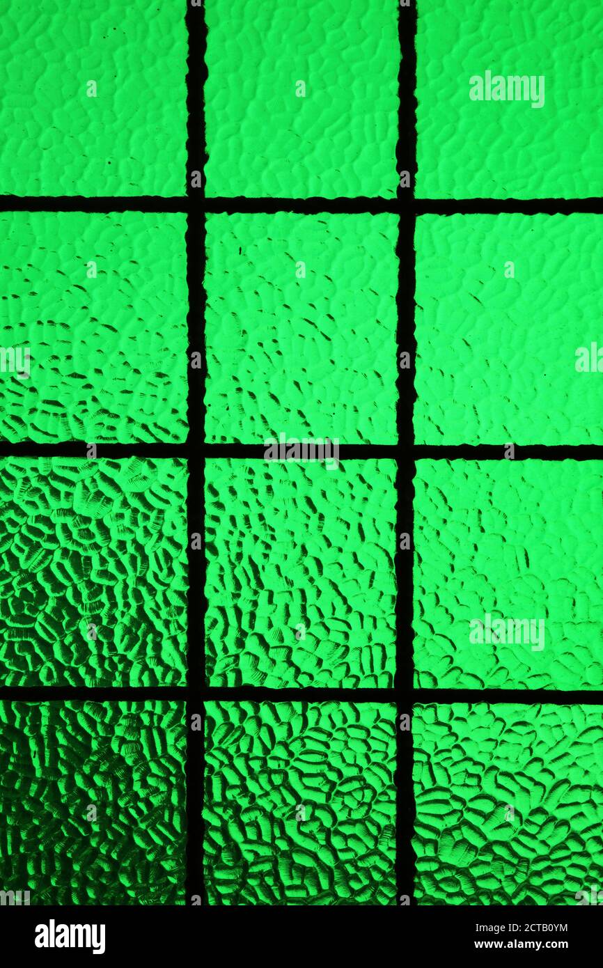 Green stained glass window frame texture background stock photo image