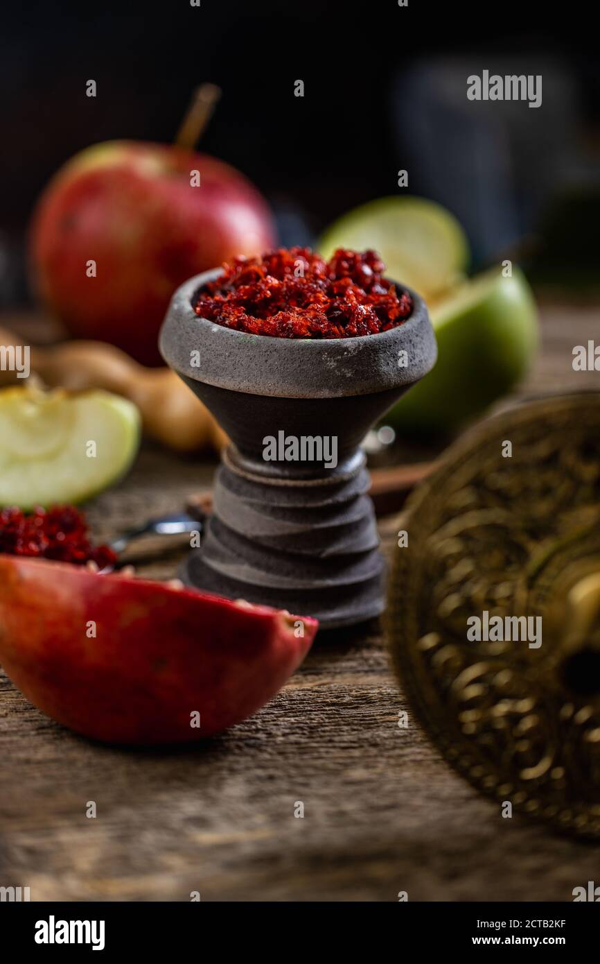 Arabian stone hookah head filled with apple and pomegranade flavoured