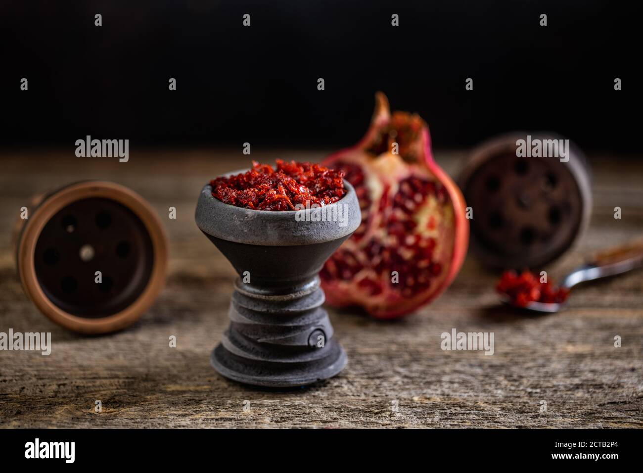 Arabian stone hookah head filled with pomegranade flavoured tobacco