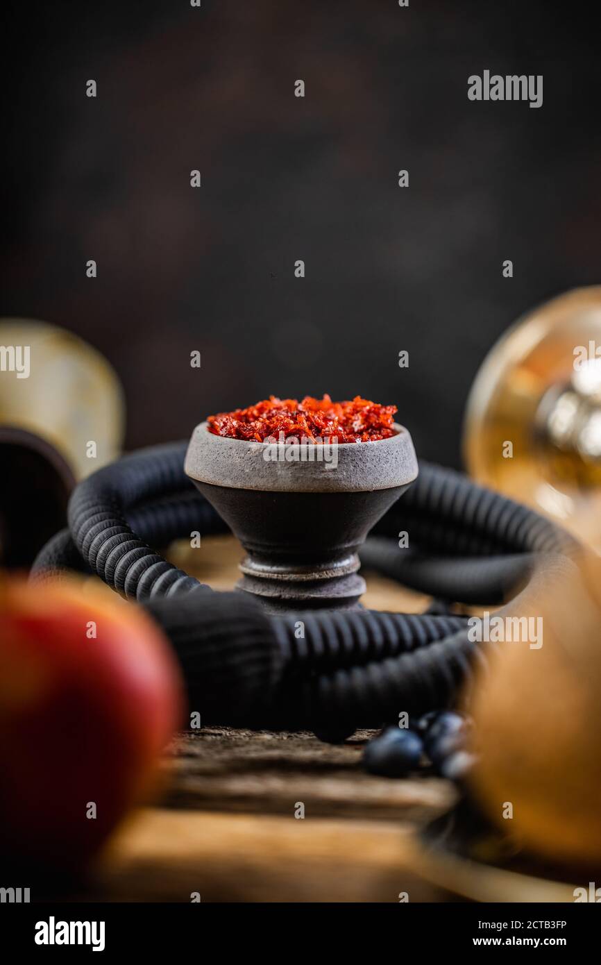 Arabian stone hookah head filled with blueberry flavoured tobacco Stock