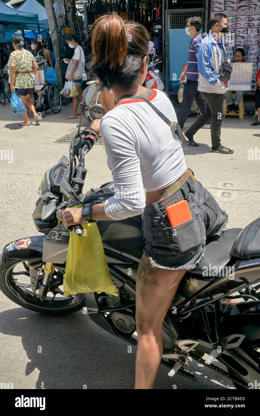 Girl riding a motorcycle. Thailand Southeast Asia Stock Photo Alamy
