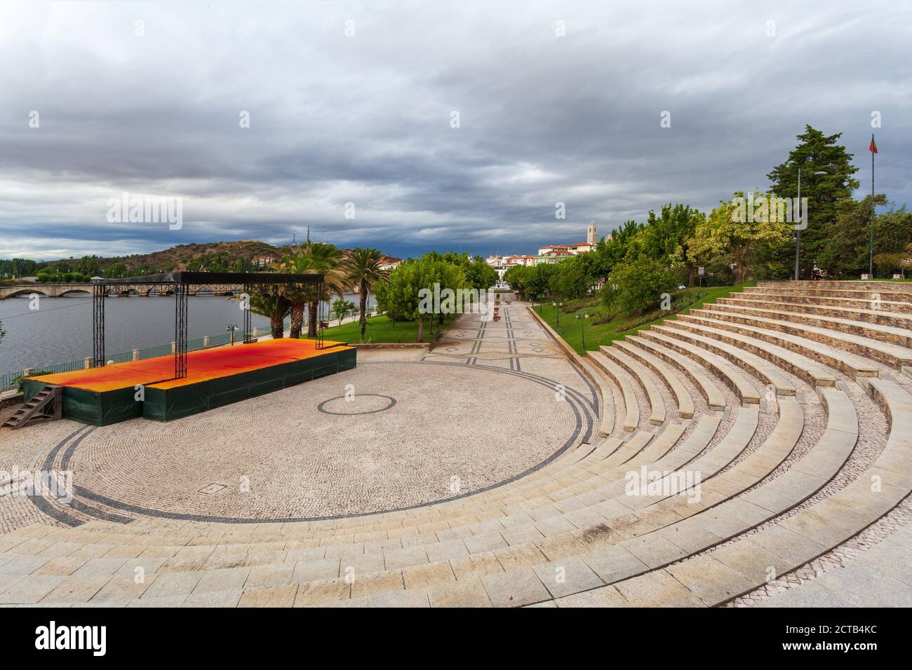 Urban landscape of the city of Mirandela in the north of Portugal. Panoramic view of the banks of the river Tua with the traditional Roman bridge and Stock Photo