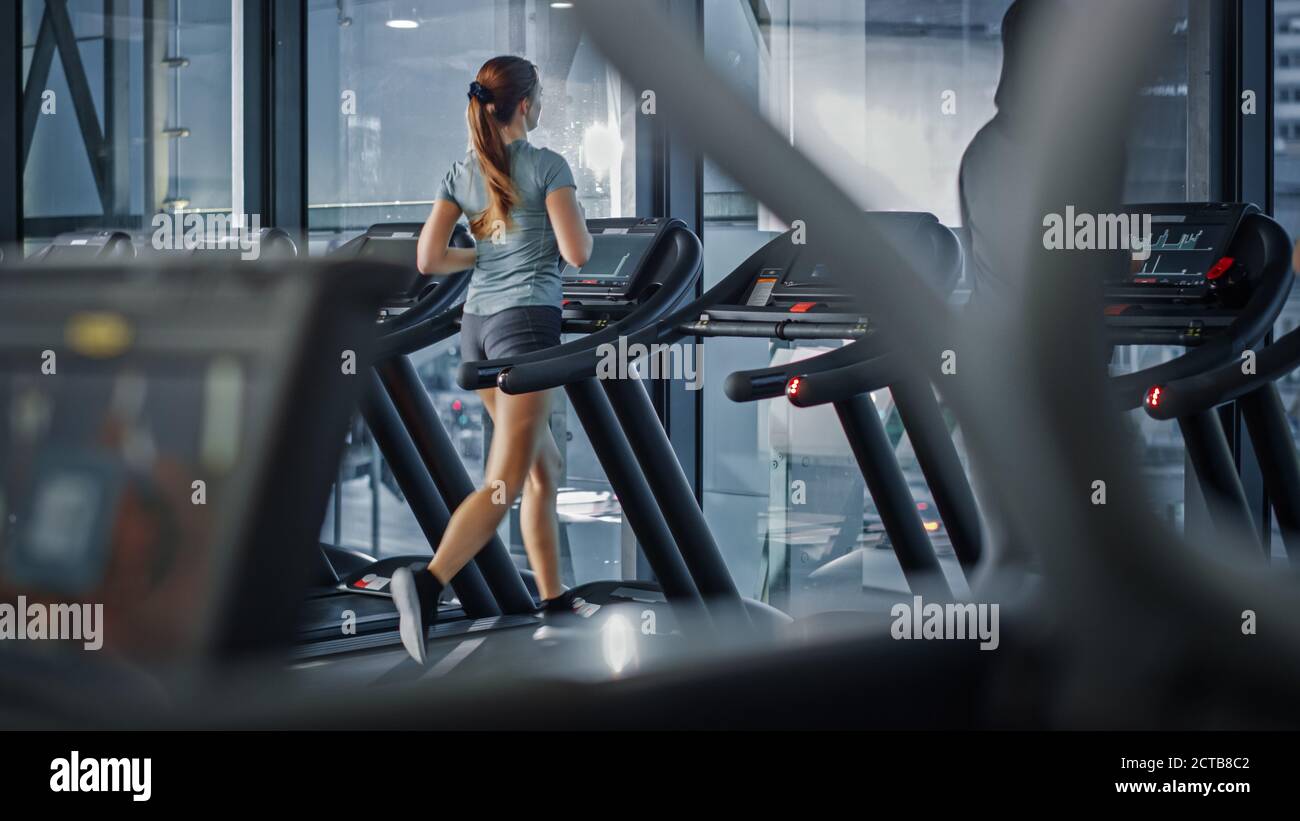 Athletic Sports Women Running On A Treadmills Energetic Fit Women Athletes Training In The Gym Female Only Fitness Club For Workout And Training Stock Photo Alamy