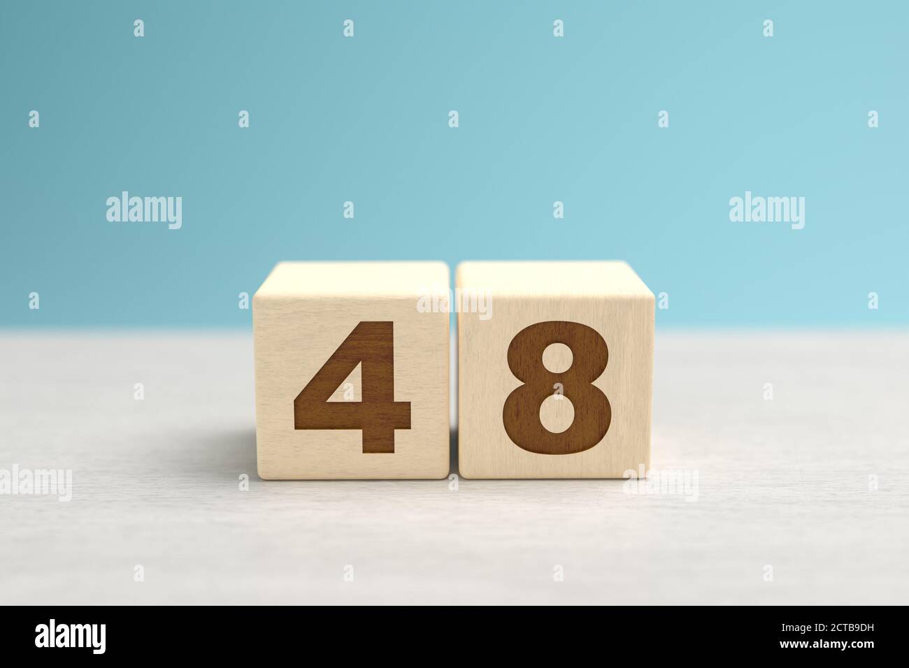 Wooden toy blocks forming the number 48 Stock Photo - Alamy