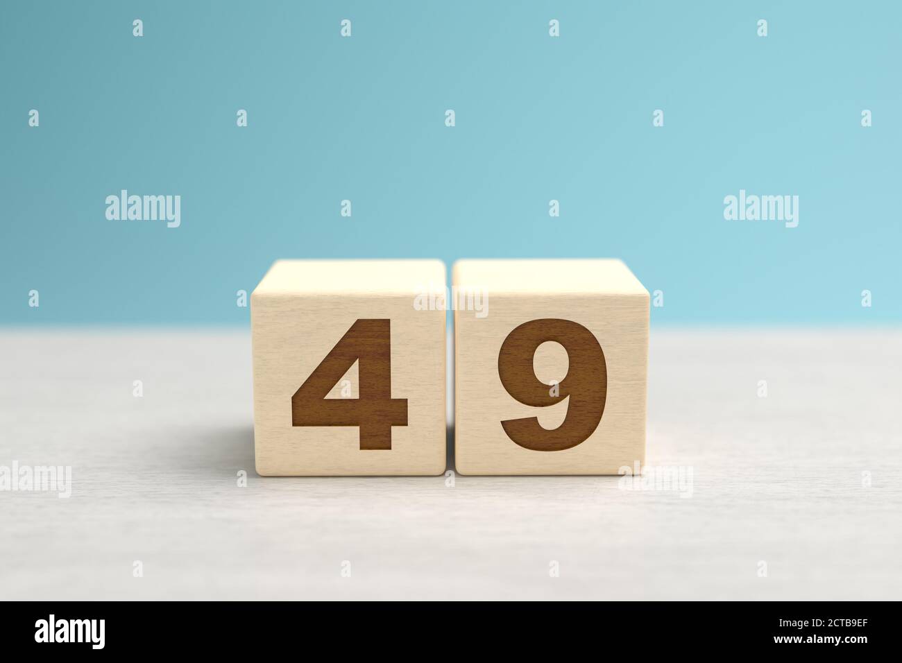 Wooden toy blocks forming the number 49. Stock Photo