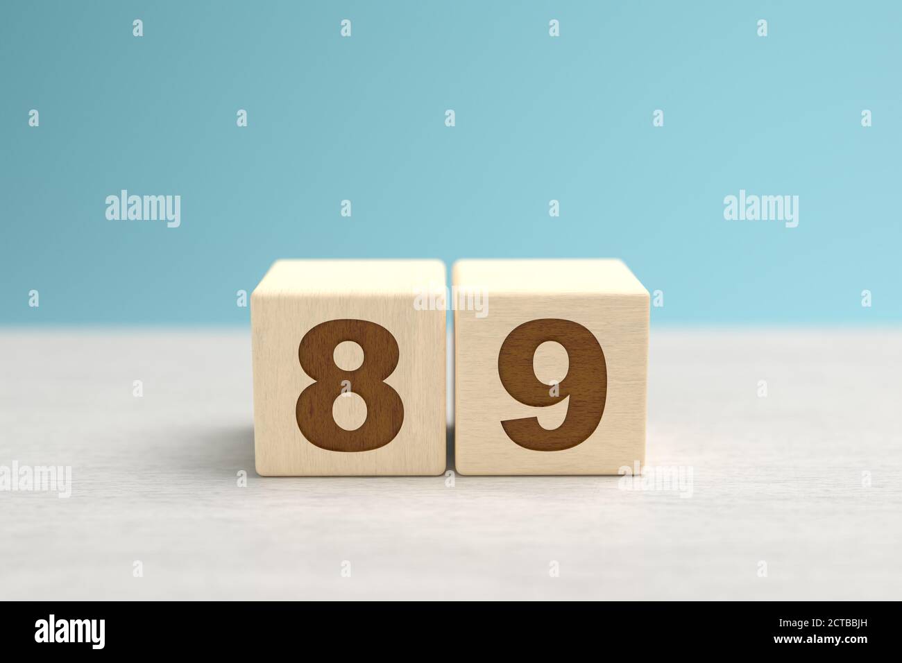 Wooden toy blocks forming the number 89. Stock Photo