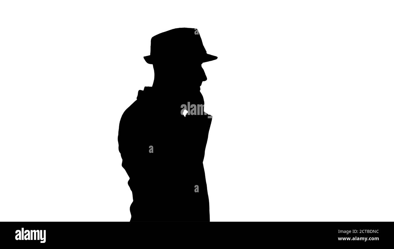 Silhouette Arabic man in casual walking and making a phone call. Stock Photo