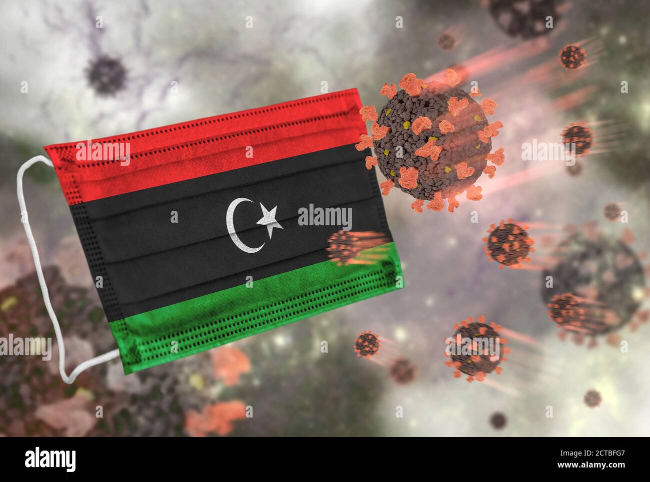 Face mask with flag of Libya, defending coronavirus Stock Photo