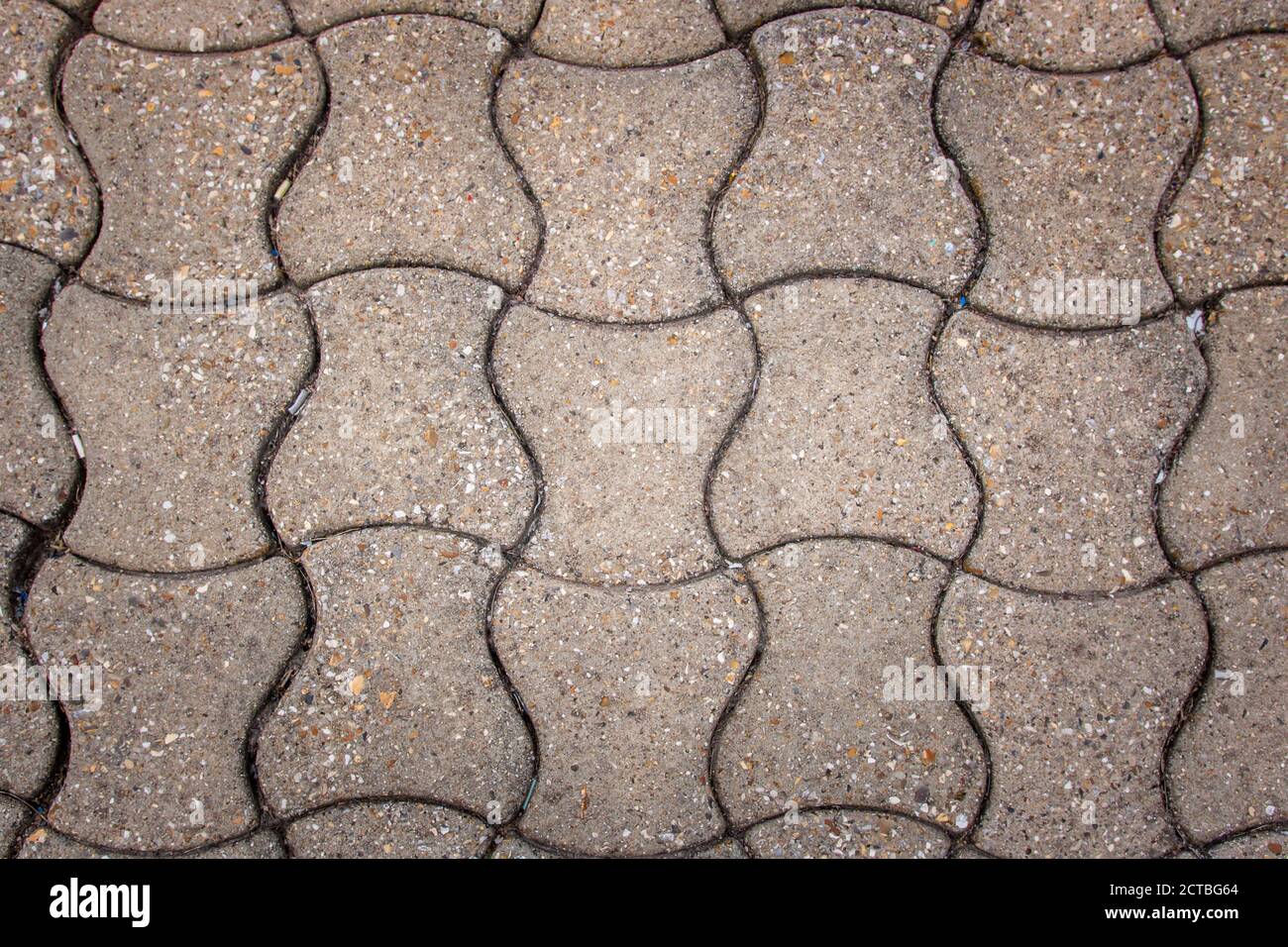 Floor in self-blocking cobblestones. Background, texture, flat lay Stock Photo