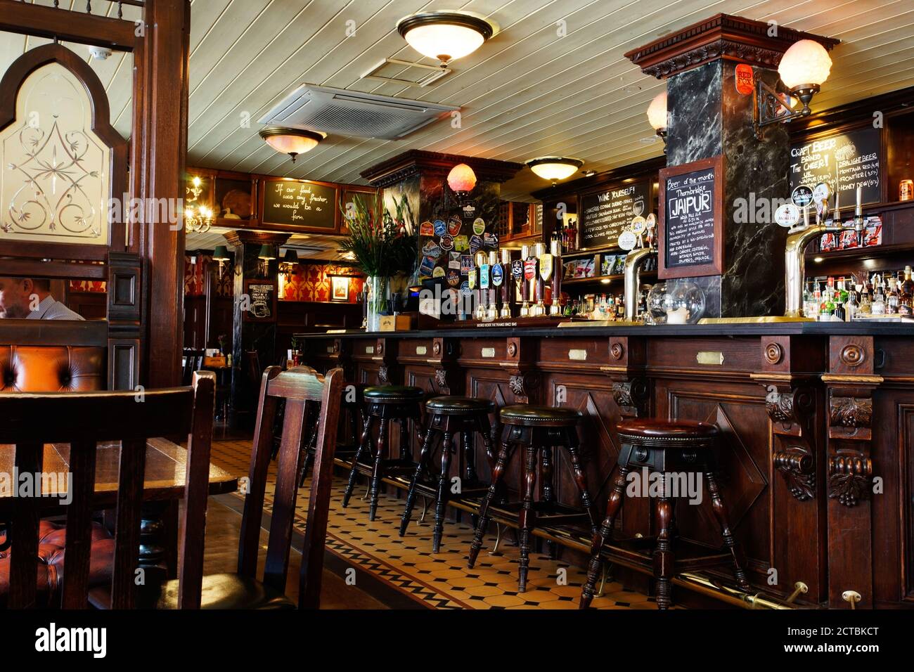 LONDON - April 26: Interior of pub, for drinking and socializing, focal point of the community, on April 26, 2017, London, UK. Pub business, now about Stock Photo