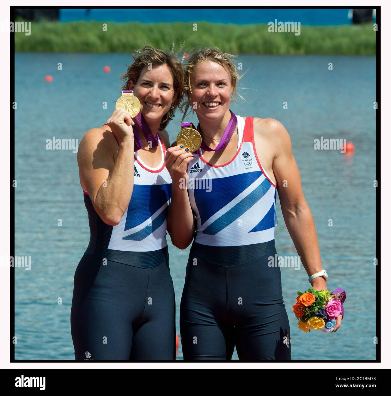 KATHERINE GRAINGER AND ANNA WATKINS CELEBRATE WINNING GOLD - WOMEN'S DOUBLE SCULLS LONDON OLYMPICS 2012  PICTURE : © MARK PAIN / ALAMY Stock Photo