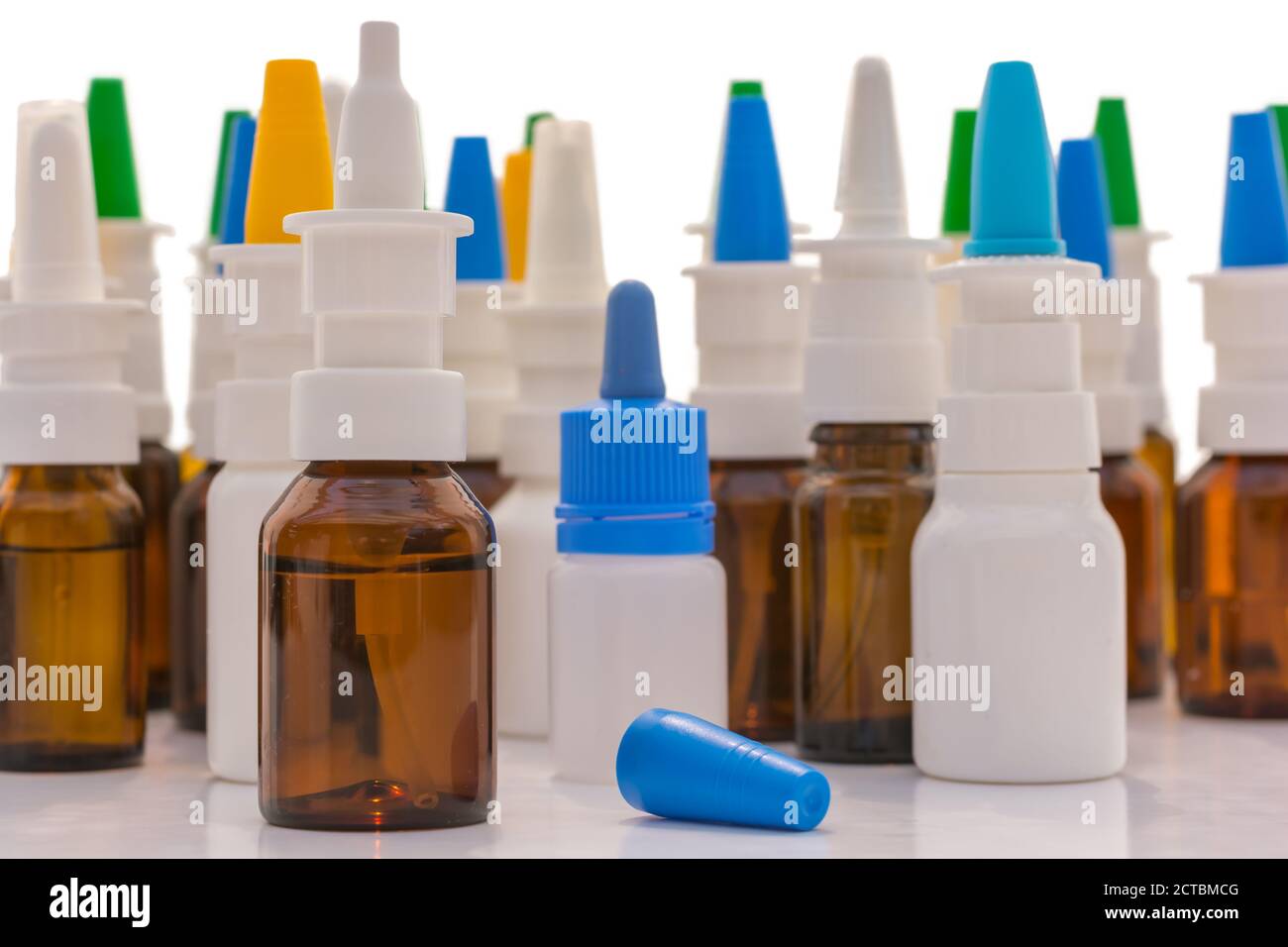 Many nasal spray in front of white background Stock Photo