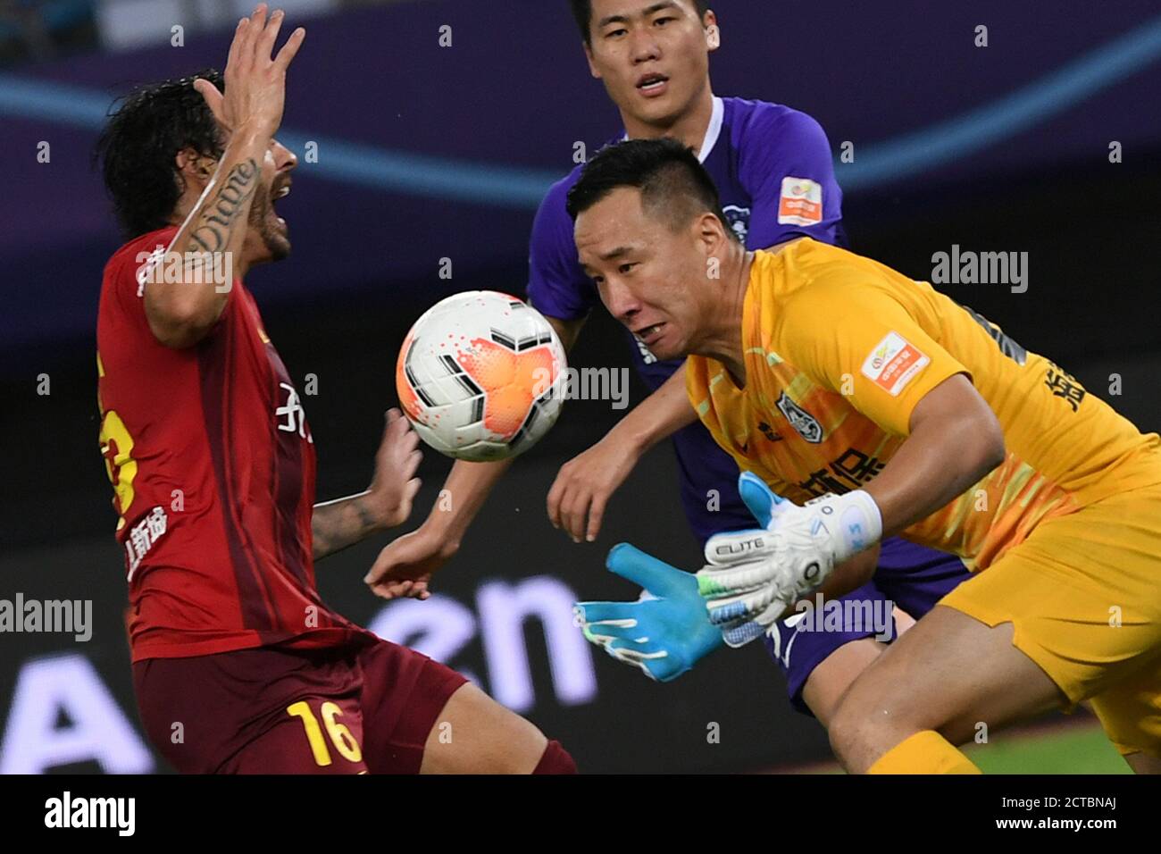 Suzhou, China's Jiangsu Province. 22nd Sep, 2020. Teng Shangkun (R), goalkeeper of the Tianjin Taida makes a save during the 12th round match between Hebei China Fortune and Tianjin Taida at the postponed 2020 season Chinese Football Association Super League (CSL) Suzhou Division in Suzhou, east China's Jiangsu Province, Sept. 22, 2020. Heibei China Fortune won 1-0. Credit: Han Yuqing/Xinhua/Alamy Live News Stock Photo