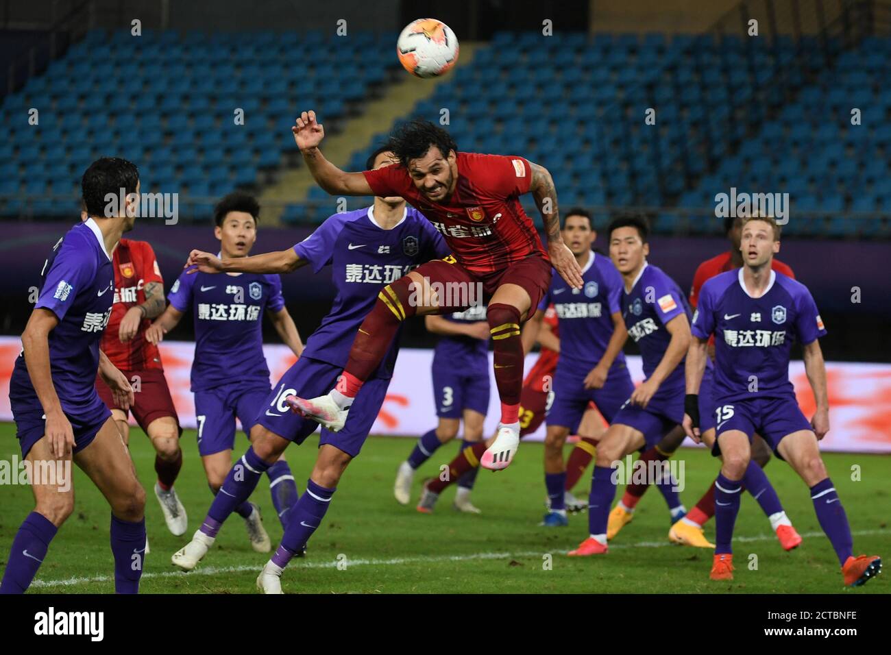 Suzhou, China's Jiangsu Province. 22nd Sep, 2020. Gao Late (Front) of Hebei China Fortune vies for the ball during the 12th round match between Hebei China Fortune and Tianjin Taida at the postponed 2020 season Chinese Football Association Super League (CSL) Suzhou Division in Suzhou, east China's Jiangsu Province, Sept. 22, 2020. Heibei China Fortune won 1-0. Credit: Han Yuqing/Xinhua/Alamy Live News Stock Photo