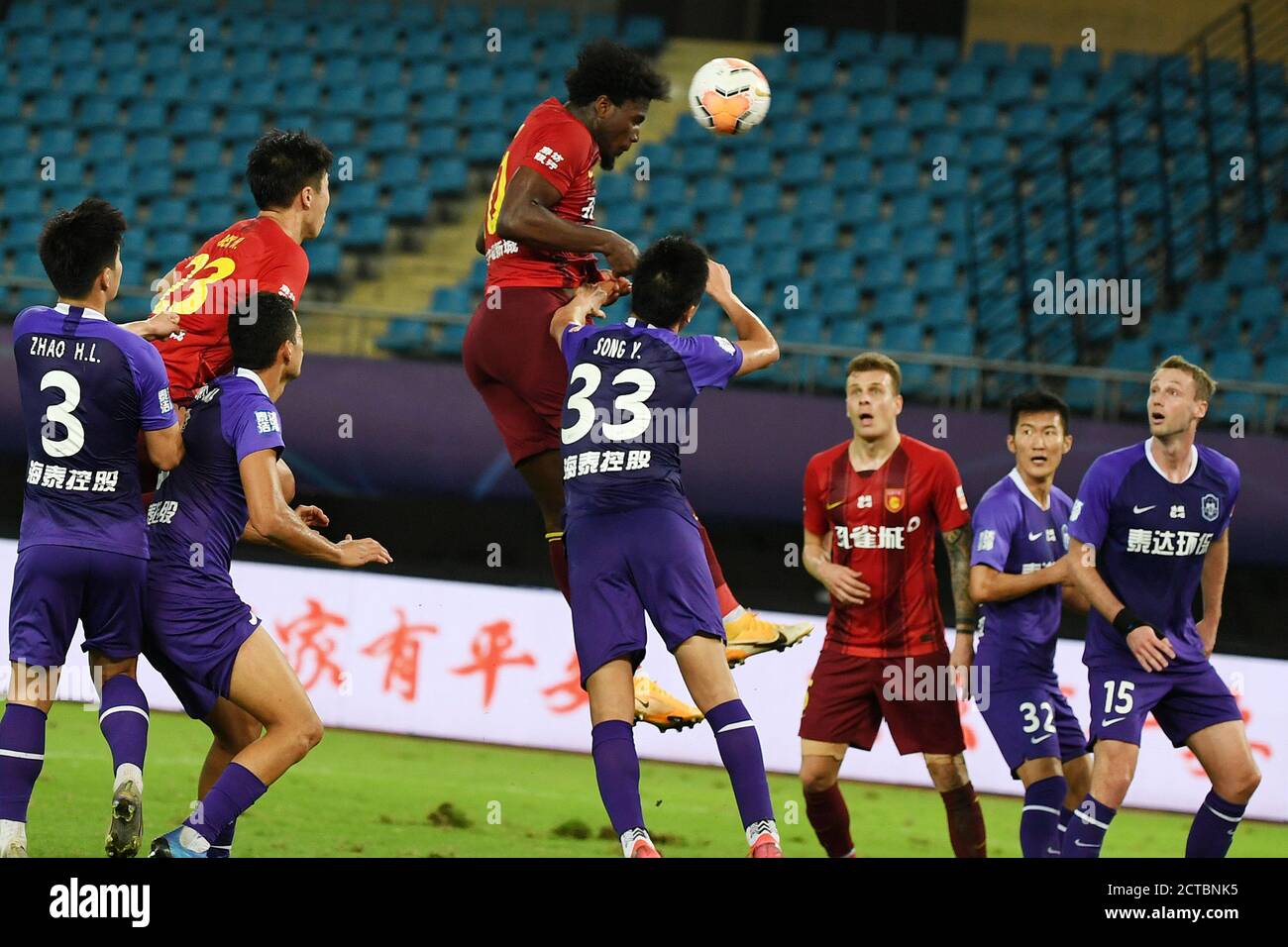 Suzhou, China's Jiangsu Province. 22nd Sep, 2020. Marko (4th L) of Hebei China Fortune heads for the ball and scores during the 12th round match between Hebei China Fortune and Tianjin Taida at the postponed 2020 season Chinese Football Association Super League (CSL) Suzhou Division in Suzhou, east China's Jiangsu Province, Sept. 22, 2020. Heibei China Fortune won 1-0. Credit: Han Yuqing/Xinhua/Alamy Live News Stock Photo