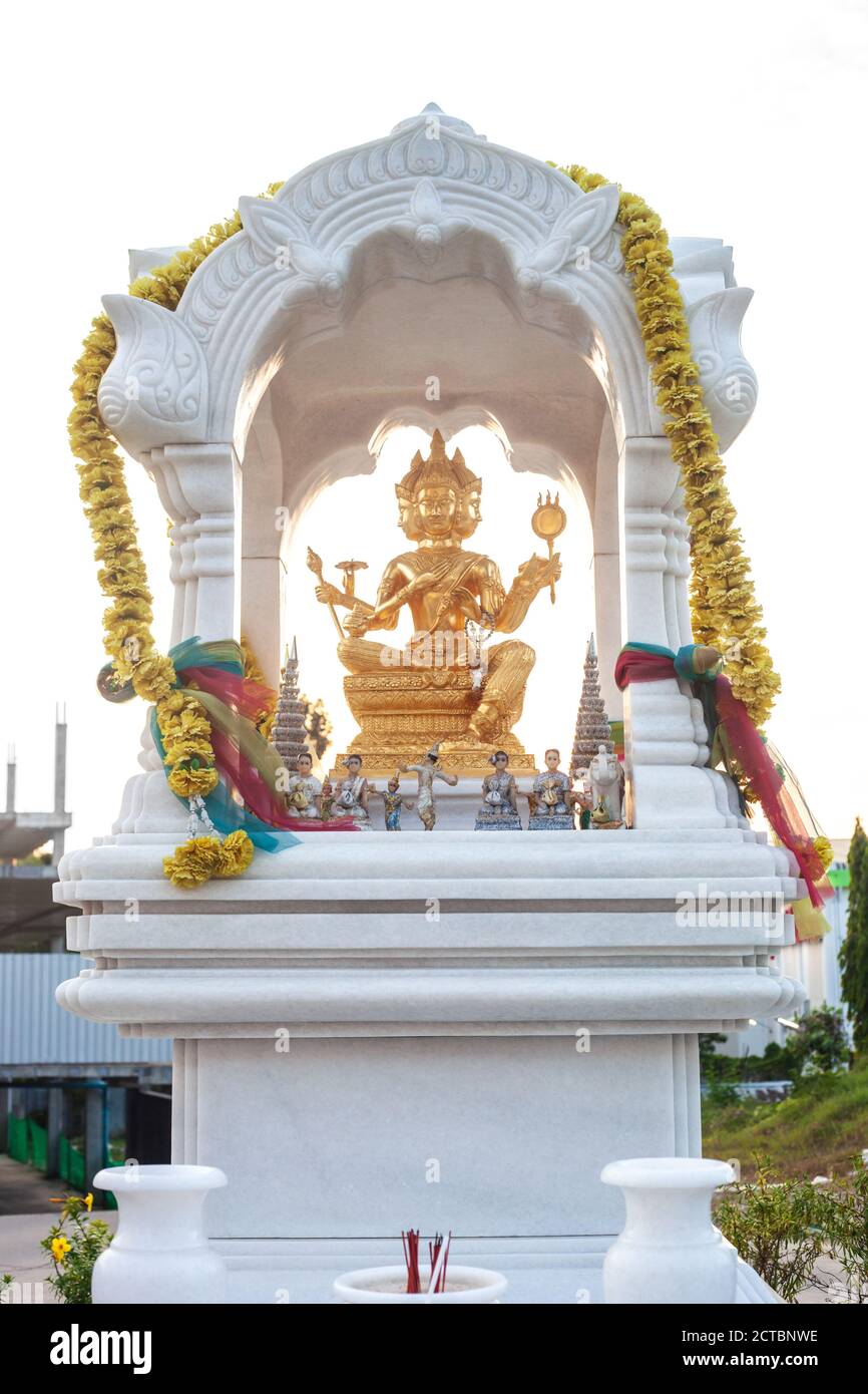 Golden color statue of Guhyasamaja Tantra. Buddha sculpture in Phuket ...