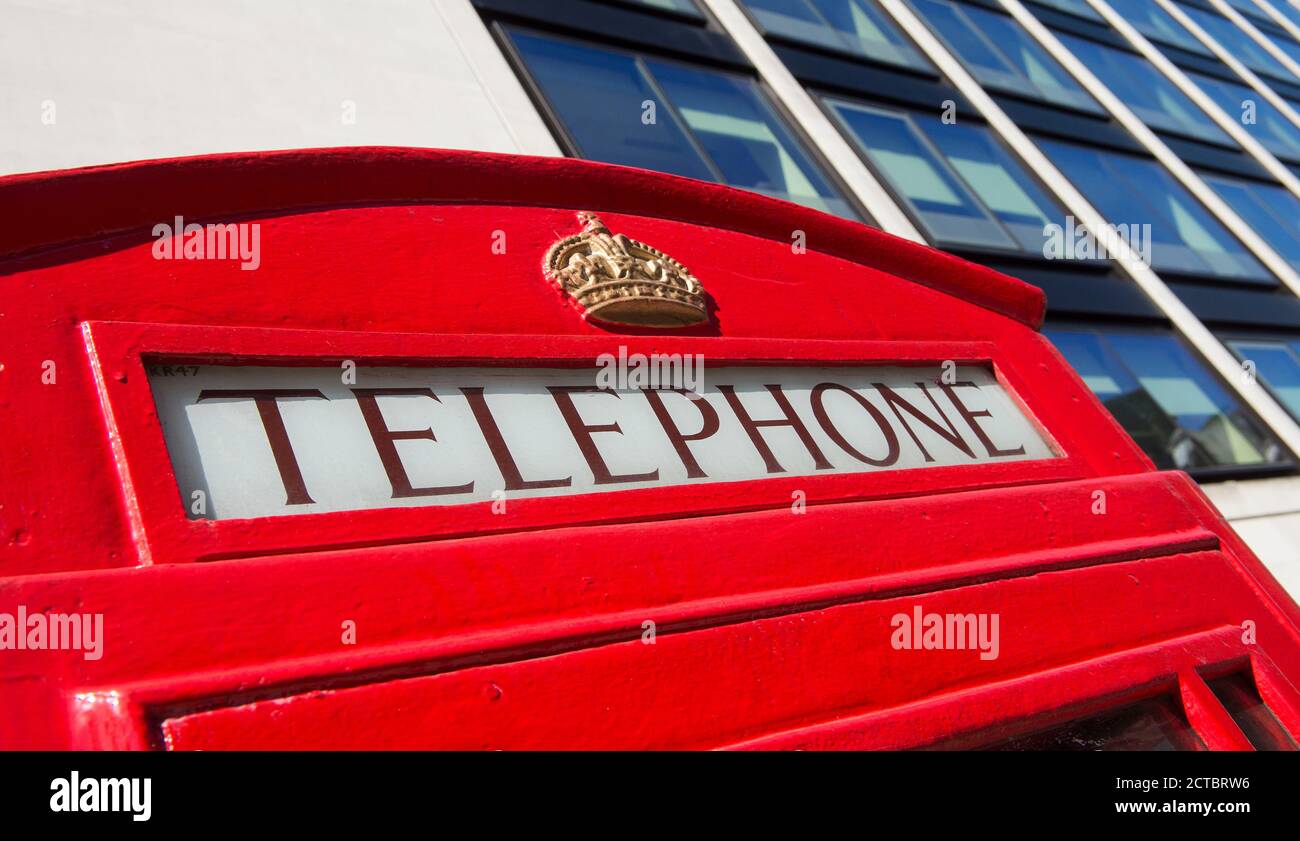 Traditional red telephone box in the capital city of London, England. Stock Photo