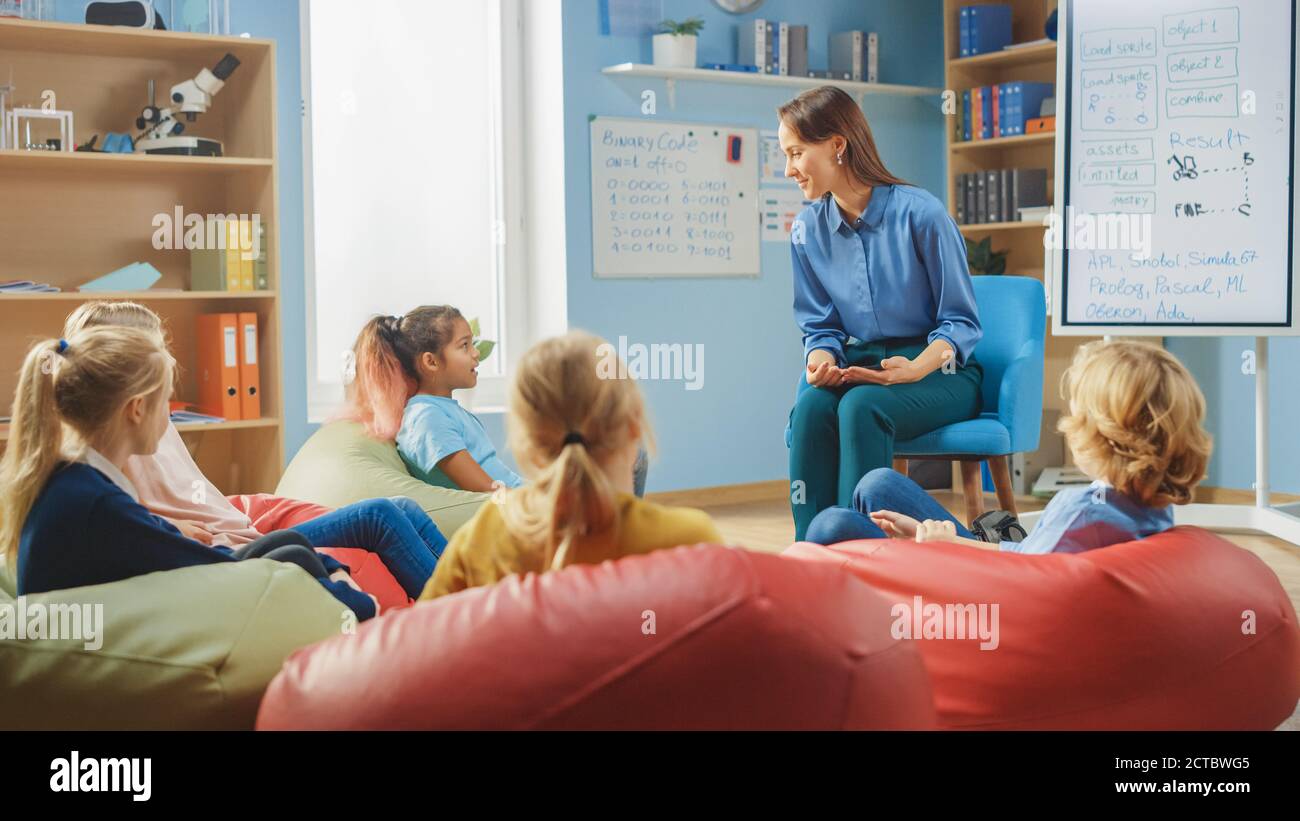 School Creativity Class: Children Sitting on the Bean Bags while Caring ...
