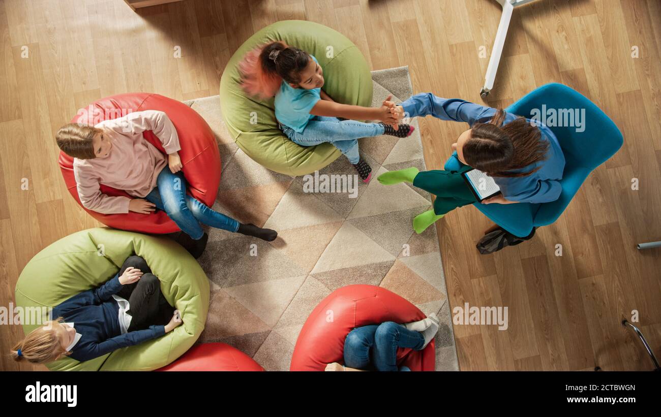 Top View Shot in Elementary School Creativity Classroom: Children ...