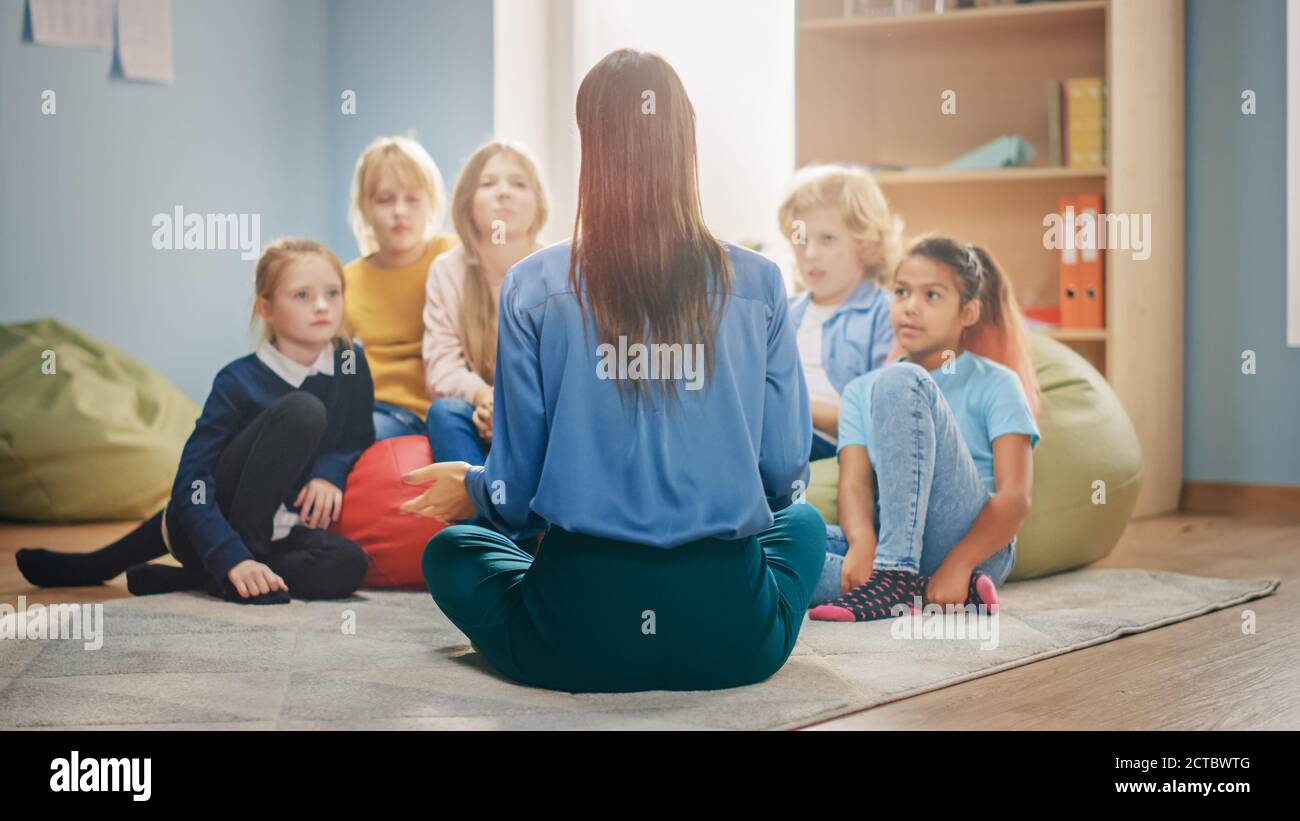 Elementary School Creativity Class: Diverse Children Sitting on Carpet ...