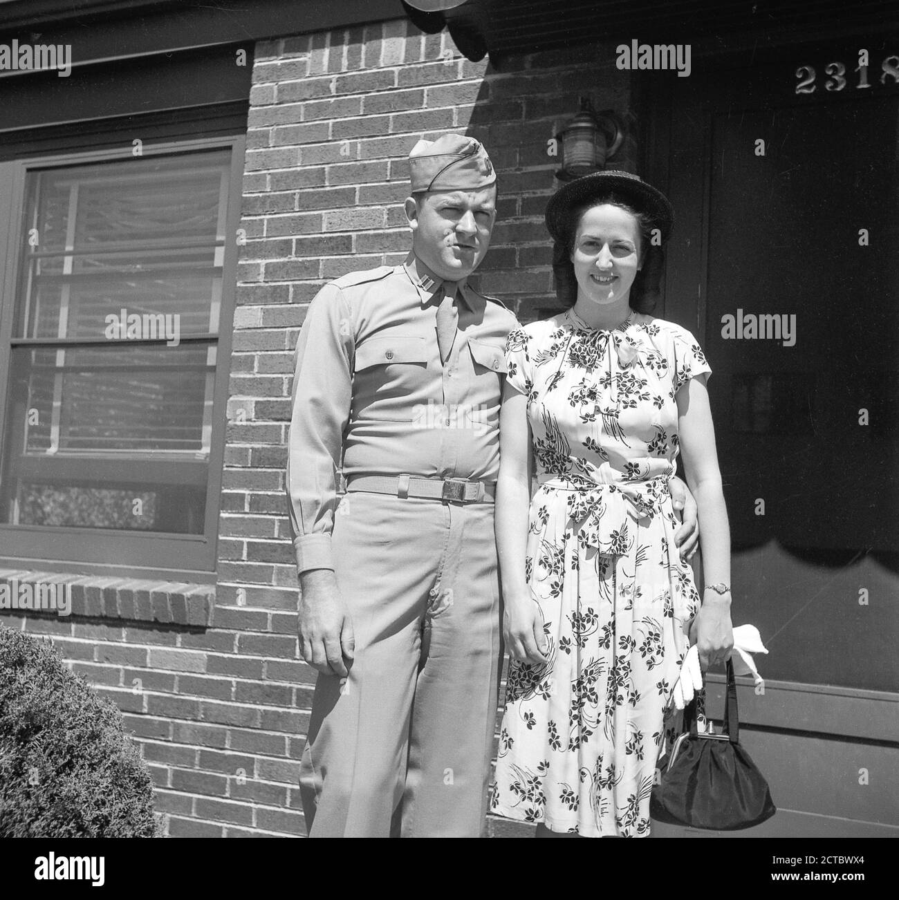 Young couple posing for the camera in 1940s, USA Stock Photo