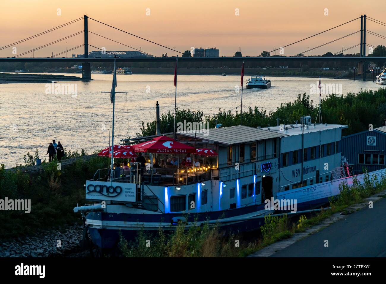 Skyline of Düsseldorf on the Rhine, , sunset, city beach at the Theodor-Heuss-Bridge, lounge bar restaurant Canoo, restaurant Schiff, beer garden, Düs Stock Photo