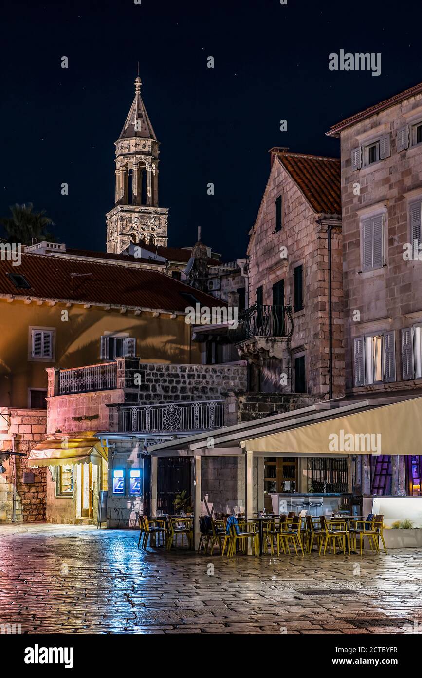 Night street and a view of the medieval tower at night in the city of Hvar on the island of Hvar in Croatia Stock Photo