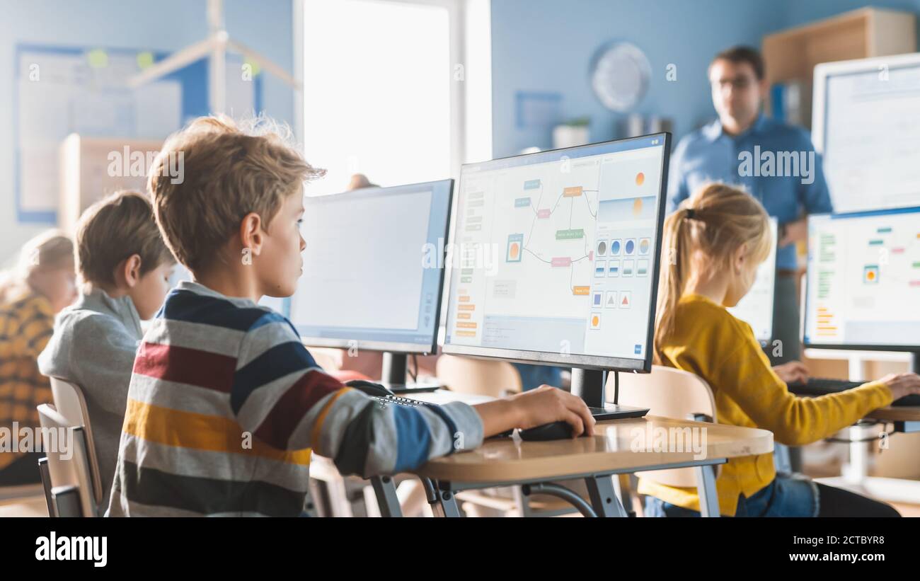 Children learn computer programming hi-res stock photography and images ...