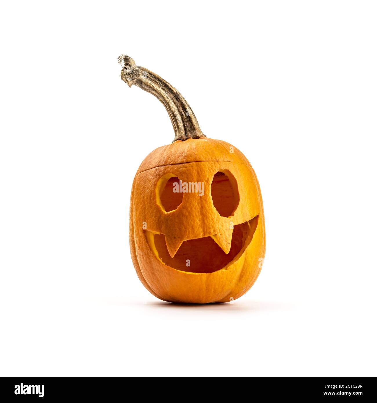 Carved Pumpkins, Smiling, on a Table Out of Doors Facing and Side