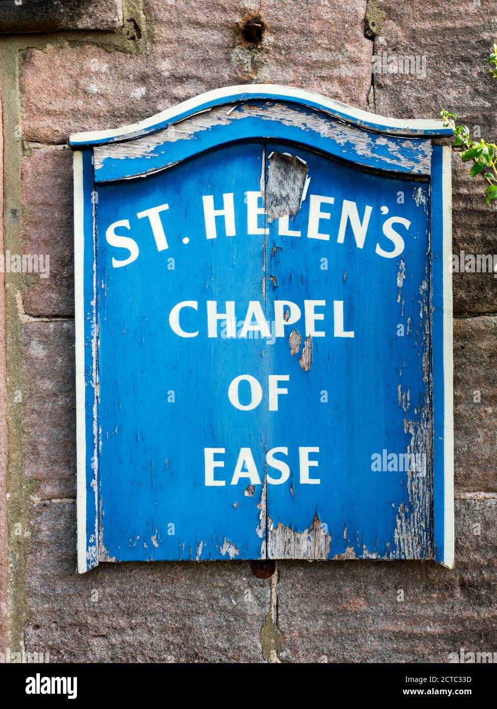 Chapel of Ease sign at St Helens Church a former carpenters workshop converted into a chapel in 1860 in Little Ribston North Yorkshire England Stock Photo