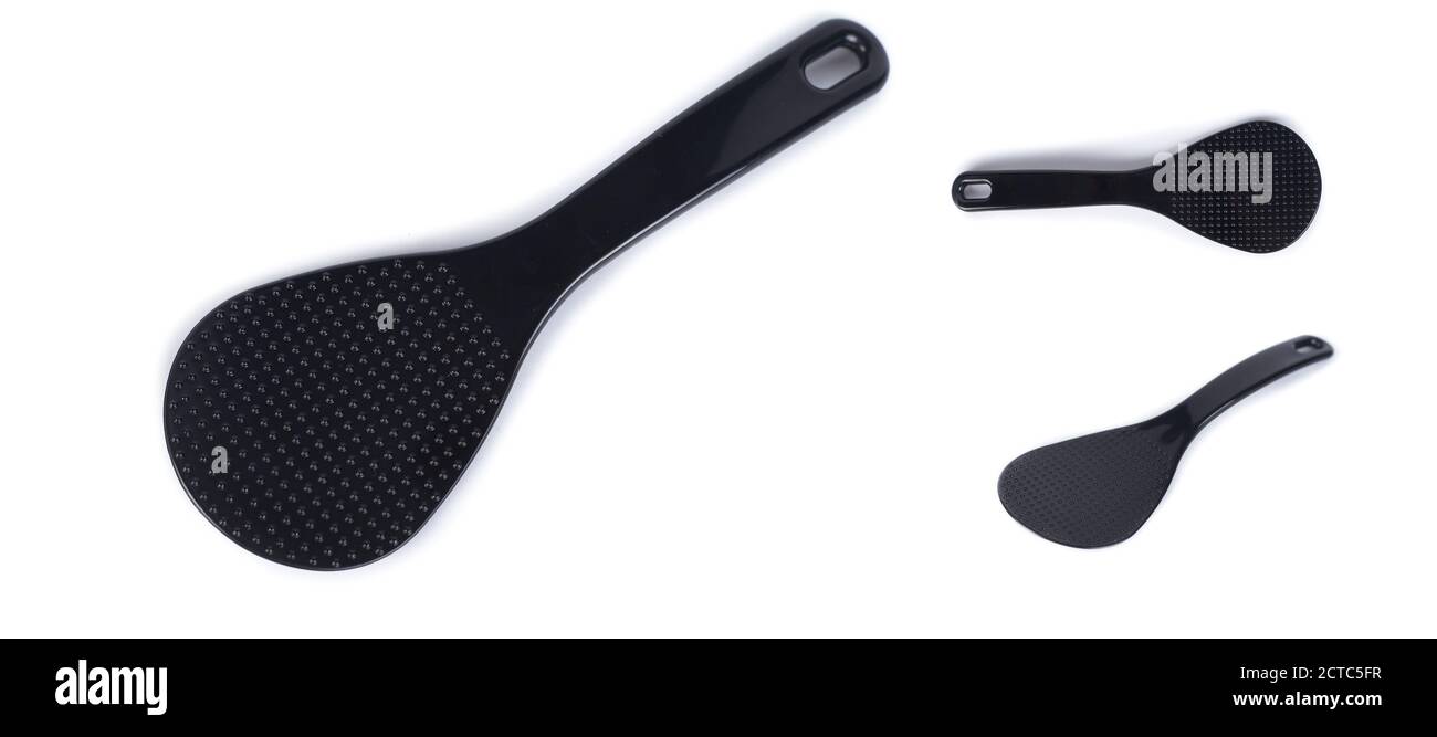 Plastic, heatresistant spoon stirrer for multicooker. Black spoon