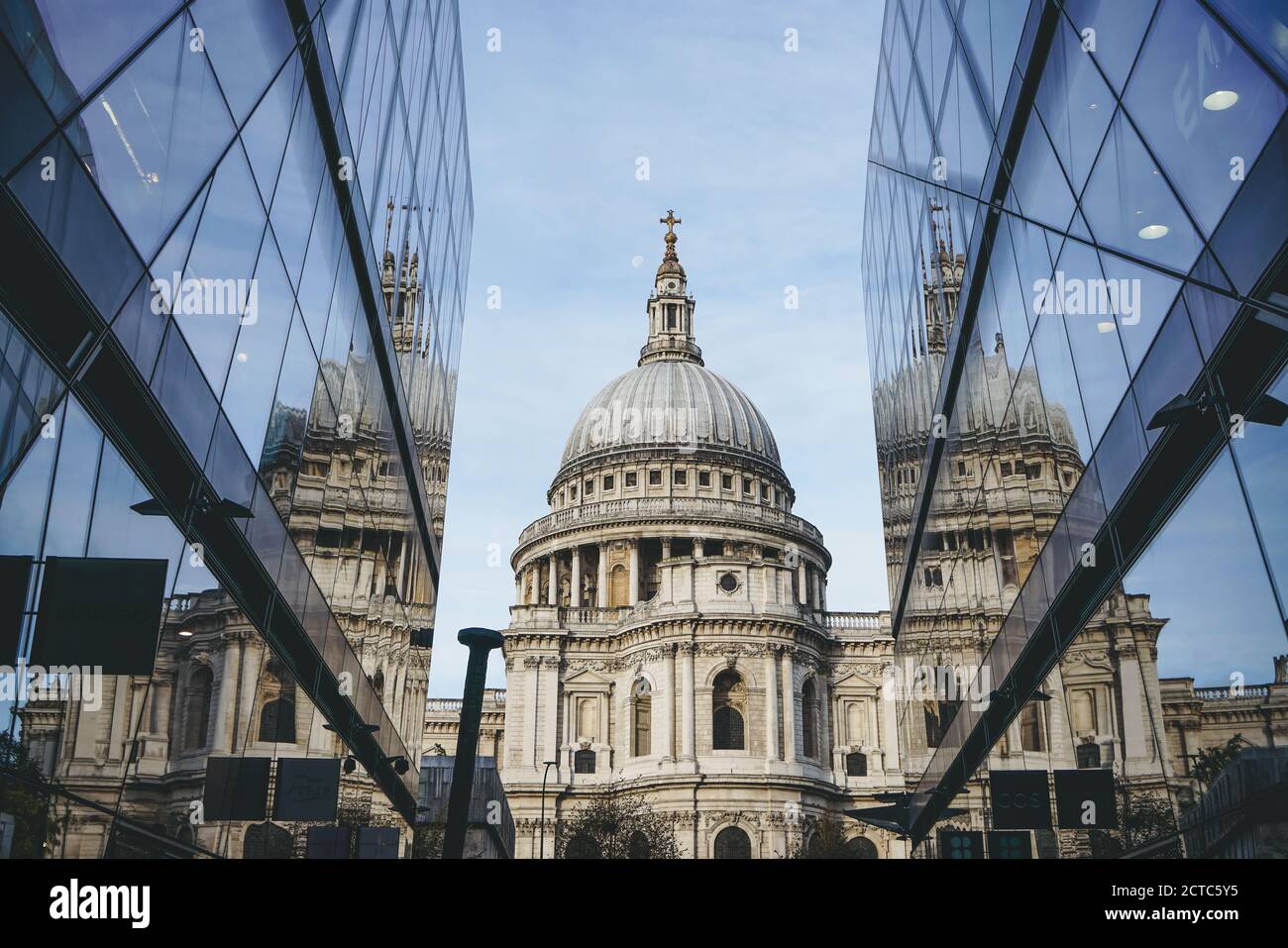 Saint Paul Cathedral reflected in modern glass walls of One New Change mall in City of London, England Stock Photo