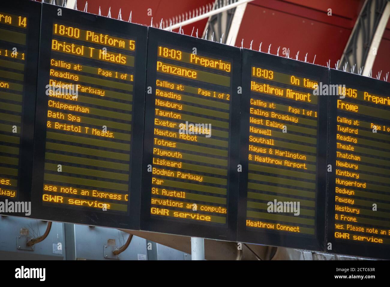 Departure boards, train timetable at London Paddington railway station Stock Photo