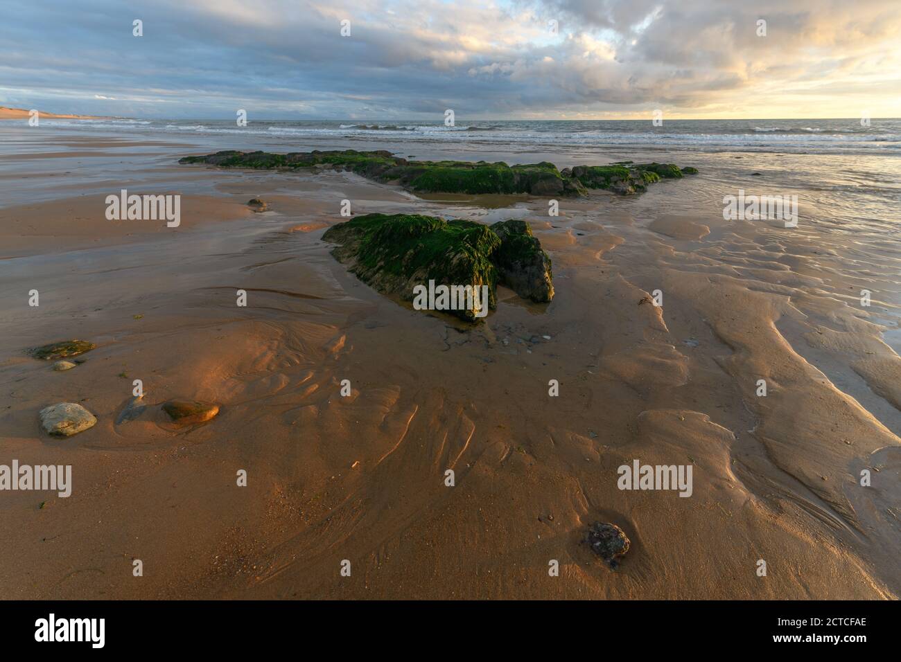 Beautiful sunset at the atlantic coast in France Stock Photo - Alamy