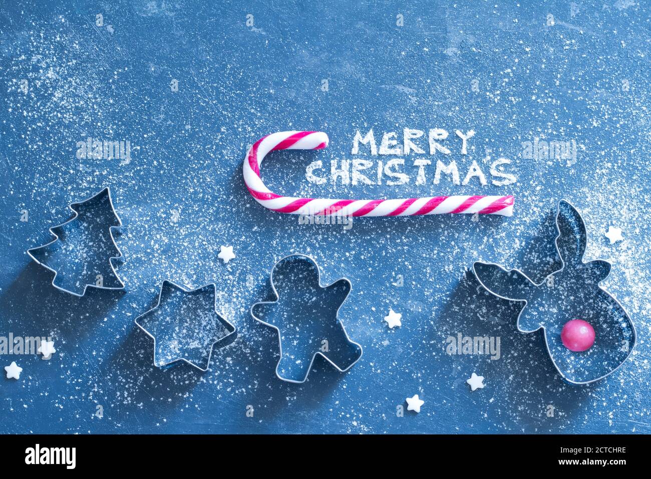 Christmas concept baking background with cookies molds and flour Stock Photo
