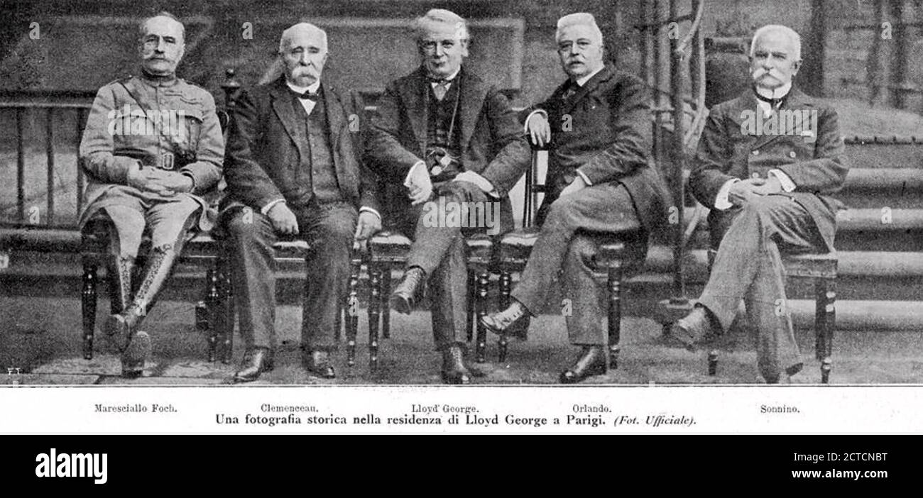 1918 PEACE CONFERENCE.  Some of the signatories in the grounds of the British Embassy in Paris. From left: Marshall Ferdinand Foch, Georges Clemenceau, David Lloyd George, Vittorio Orlando, Sidney Sonnino (Italian Foreign Minister) Stock Photo