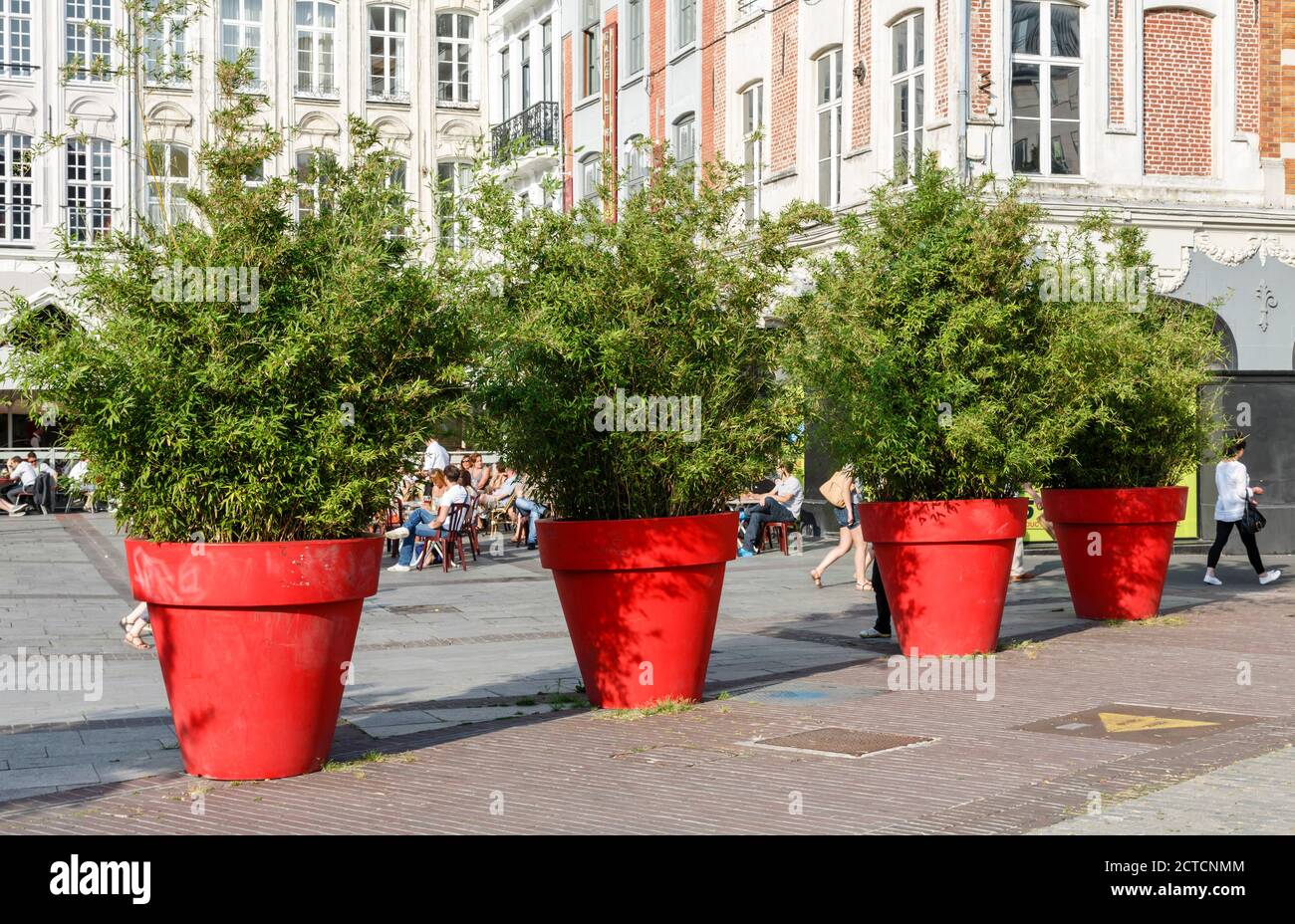 LILLE, FRANCE - July 18, 2013. Giant red flower pots in Lille city centre Stock Photo