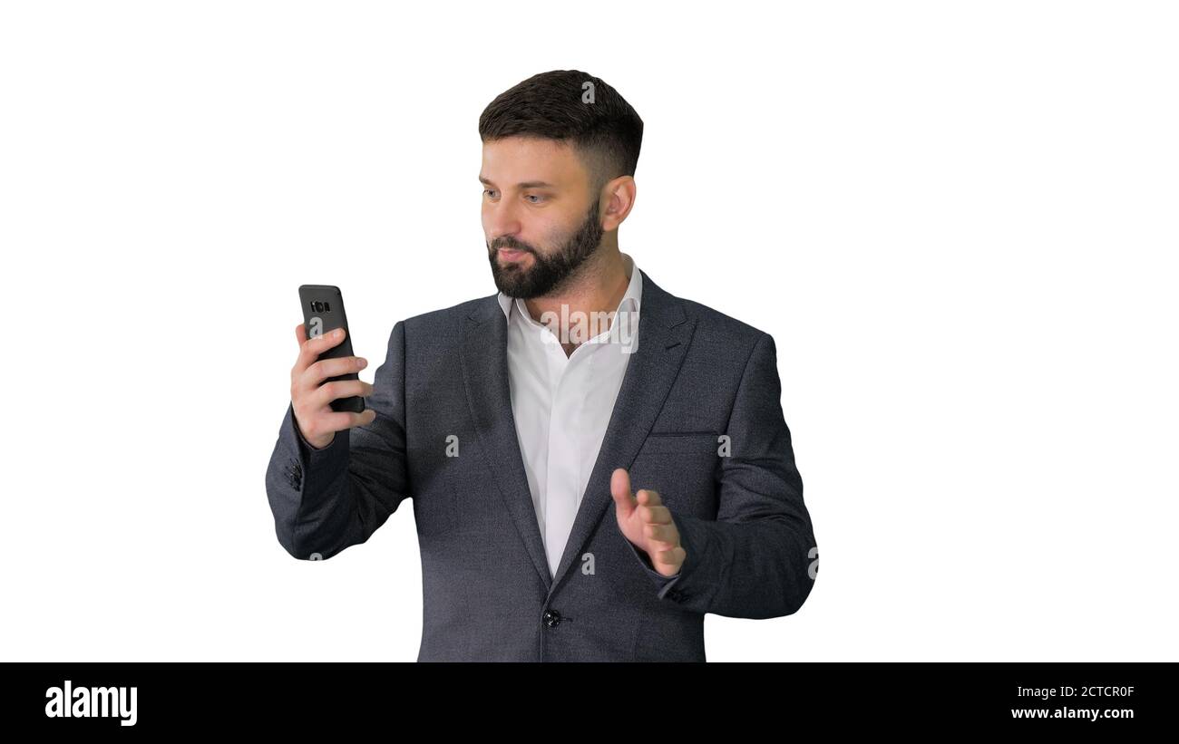 Handsome businessman walking and recording story for a social ne Stock Photo
