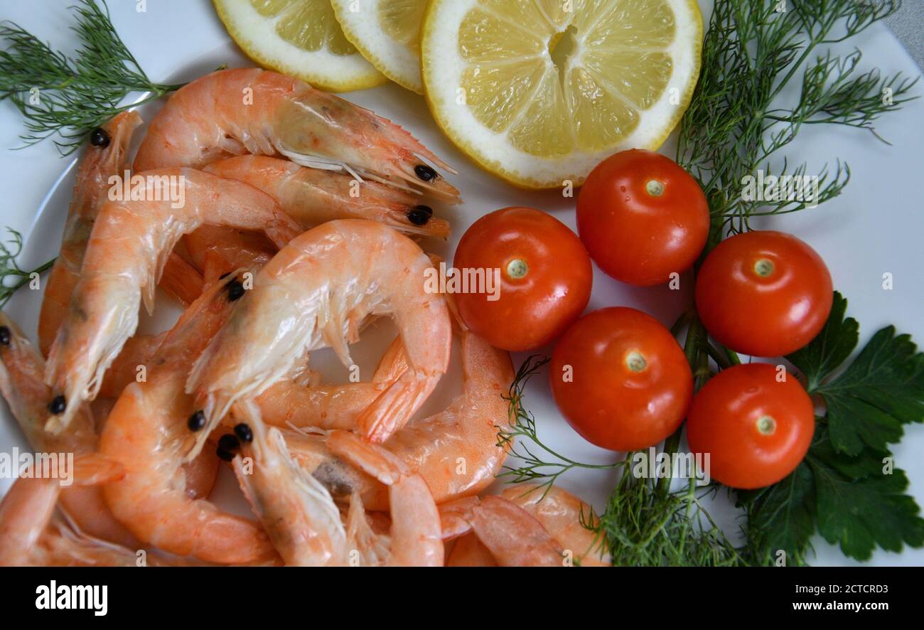 Prawns (Latin. Caridea) - recipes of culinary dishes with shrimp are popular in many countries Stock Photo