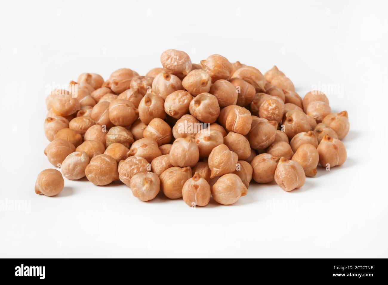 Handful of chickpea seeds close up isolated on white background Stock Photo
