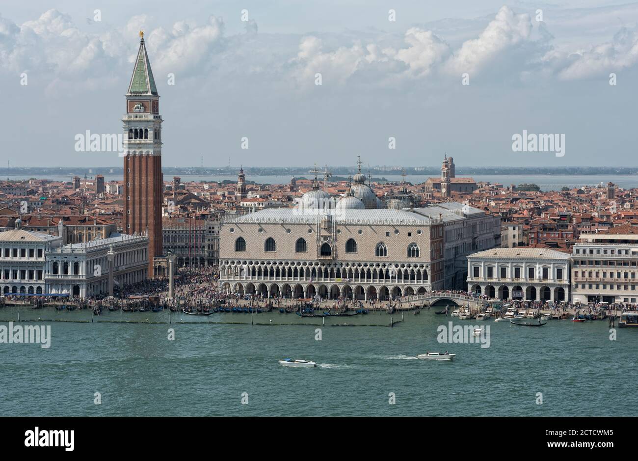 Doge's palace, San Marco's Campanile set in the larger context of the island. Shot taken at San Giorgio Maggiore bell tower from across Venice's lagoon, Italy. Stock Photo
