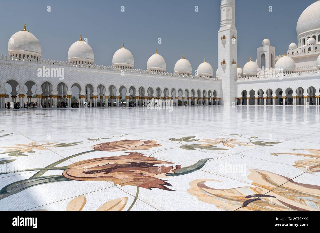 A day shot of the Sheikh Zayed Grand Mosque, Abu Dhabi inner courtyard marble floor with domes, arches and columns. Mosque completed 2007. Stock Photo