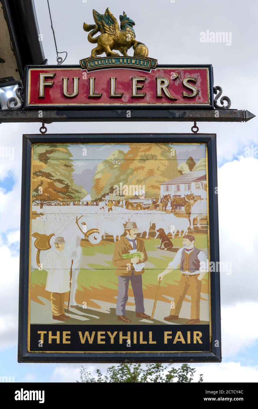 Traditional hanging pub sign at  The Weyhill Fair public house a Fuller's Pub at Weyhill, Andover, Hampshire, England, UK Stock Photo