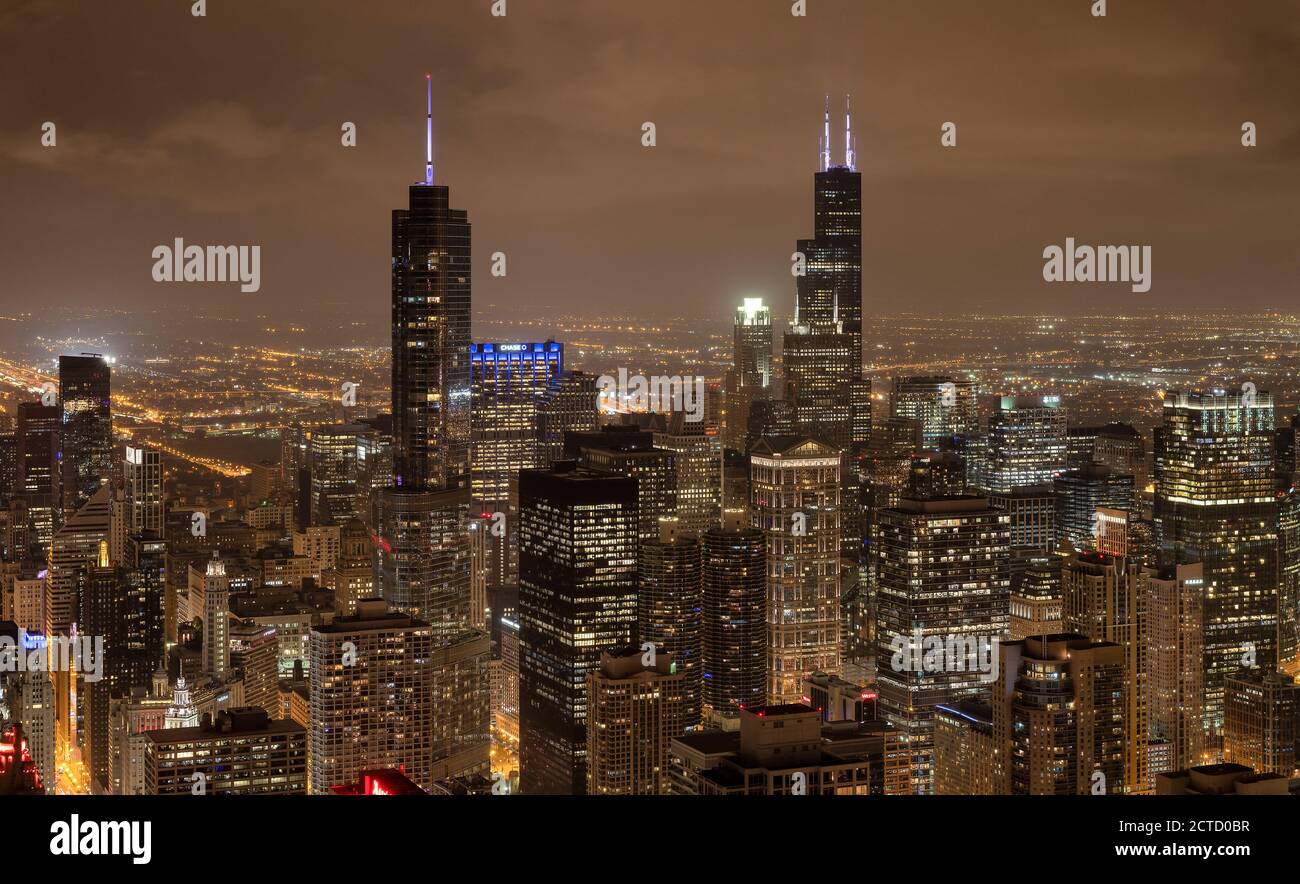 Downtown skyscrapers and residential towers at night, Chicago, Illinois, USA. Stock Photo