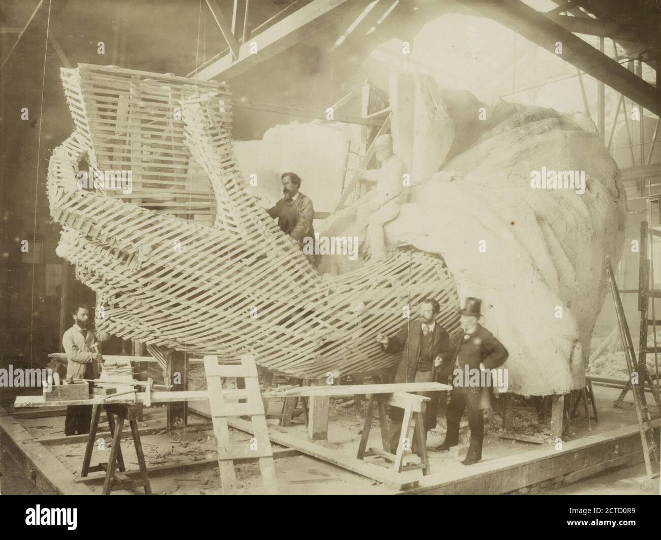 Construction of the skeleton and plaster surface of the left arm and hand of the Statue of Liberty., still image, Photographs, 1883, Fernique, Albert, 1841-1898 Stock Photo